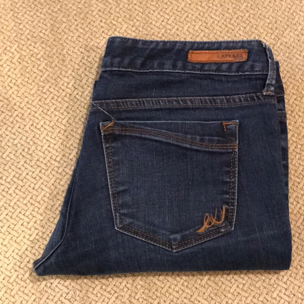 Express dark wash skinny jeans